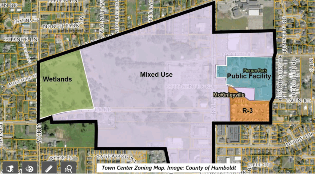 A satellite image of part of McKinleyville is overlaid with colored shapes representing zoning districts in the Town Center area. Almost all of it is light purple, labeled "Mixed Use."